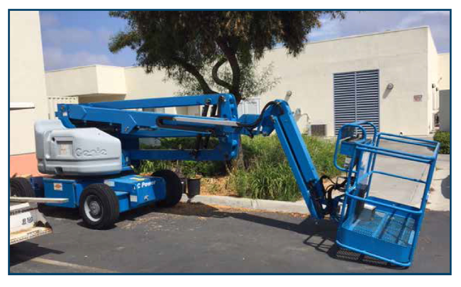Figure 7 is a photograph showing the blue Genie boom lift parked at the Chula Vista Veterans Home.